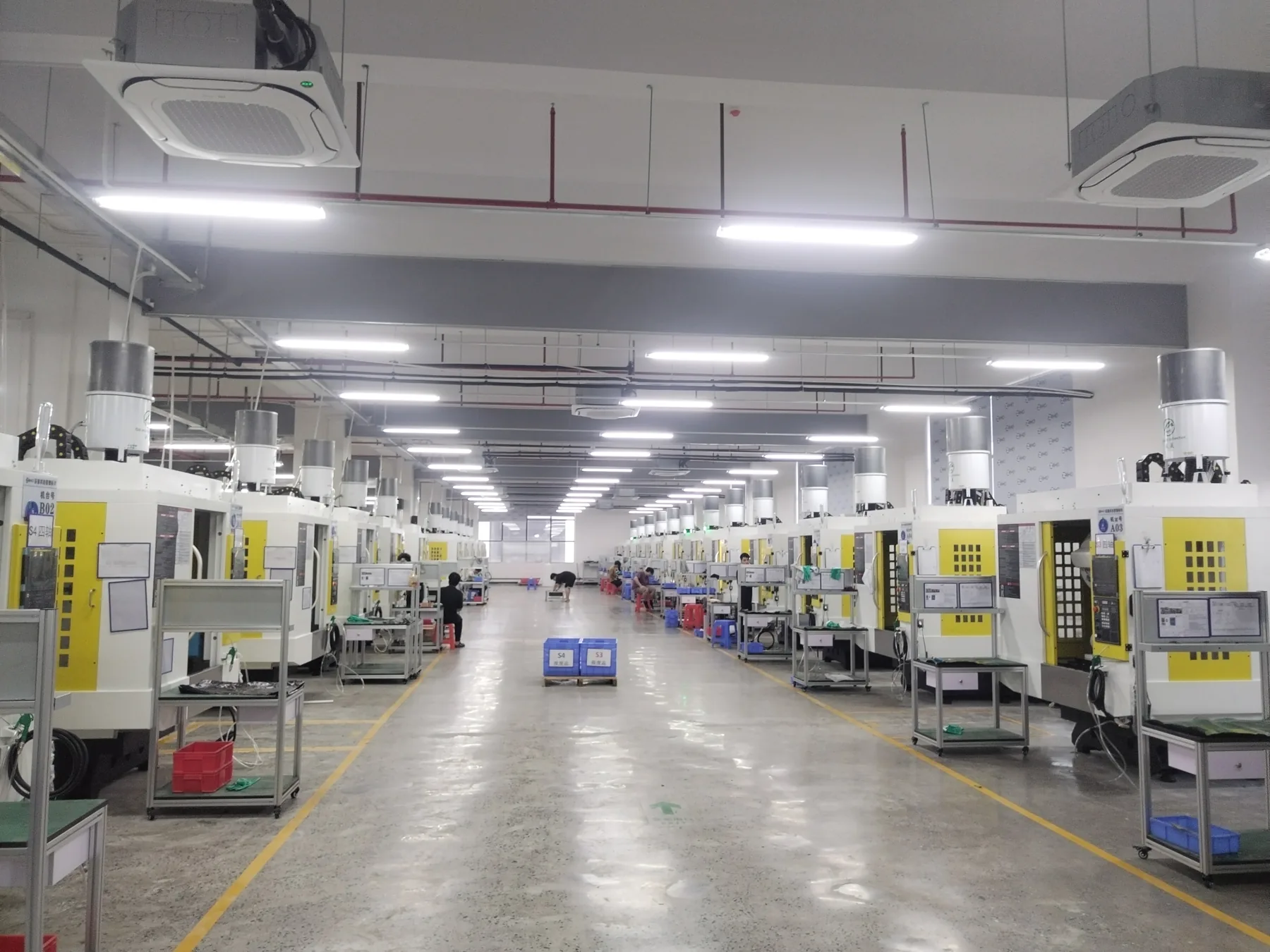 TINME oil mist collectors installed in a CNC workshop